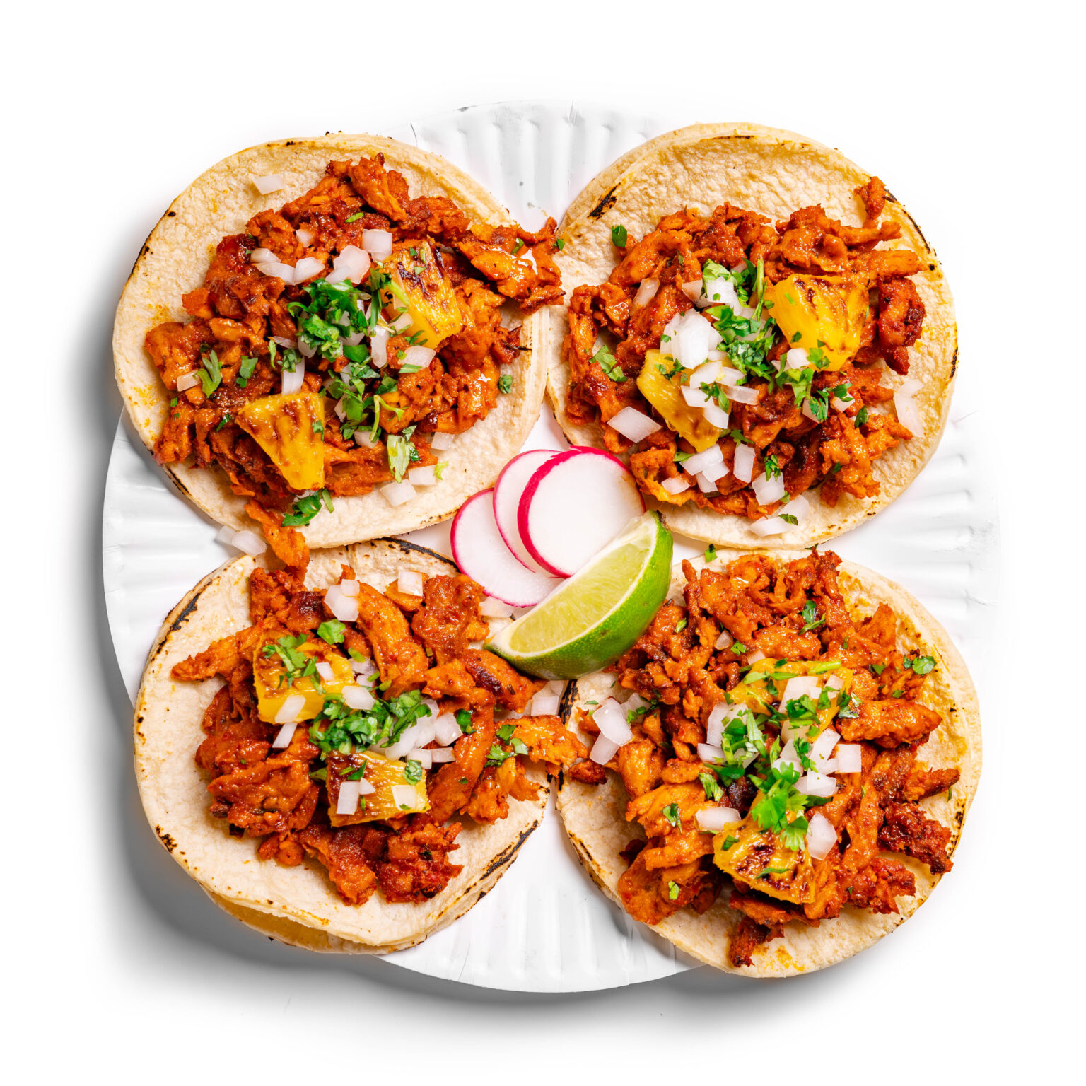 Halal ground beef tacos al pastor style with pineapple and achiote spice for sweet tangy variation